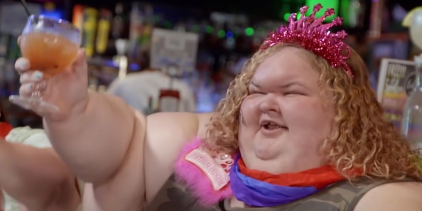 Tammy Slaton holds up a drink and smiles while wearing a tiara on 1000-Lb. Sisters