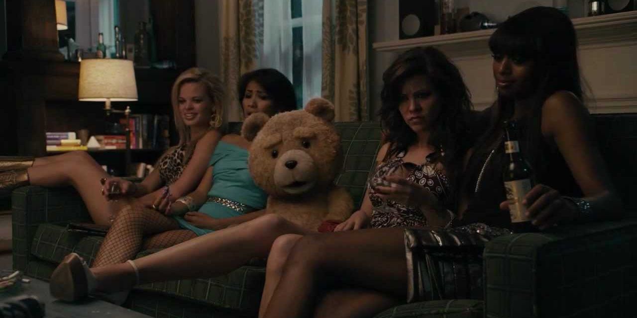 Ted on the couch with four prostitutes in Ted