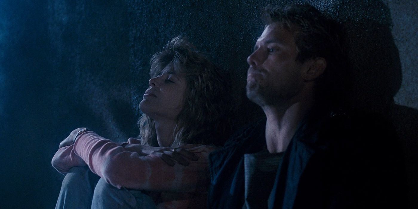 Sarah Connor and Kyle Reese hide out from the Terminator at night