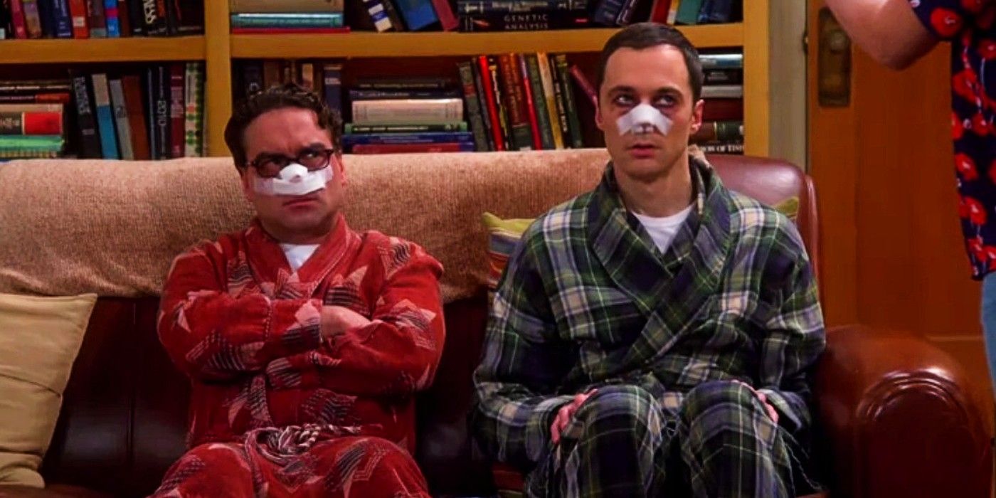 Sheldon and Leonard sitting on the couch with broken noses on TBBT