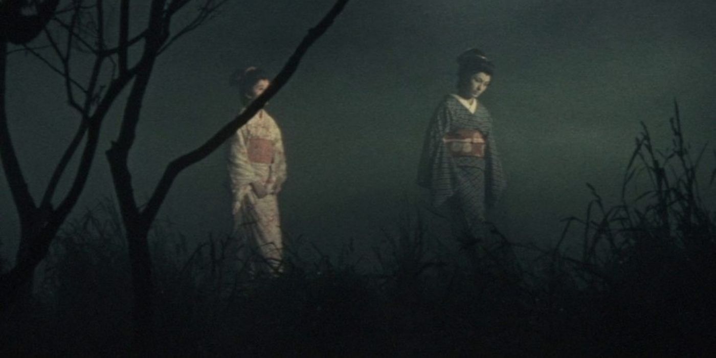 Two women walking in a solitary field in the movie The Ghost Of Yotsuya