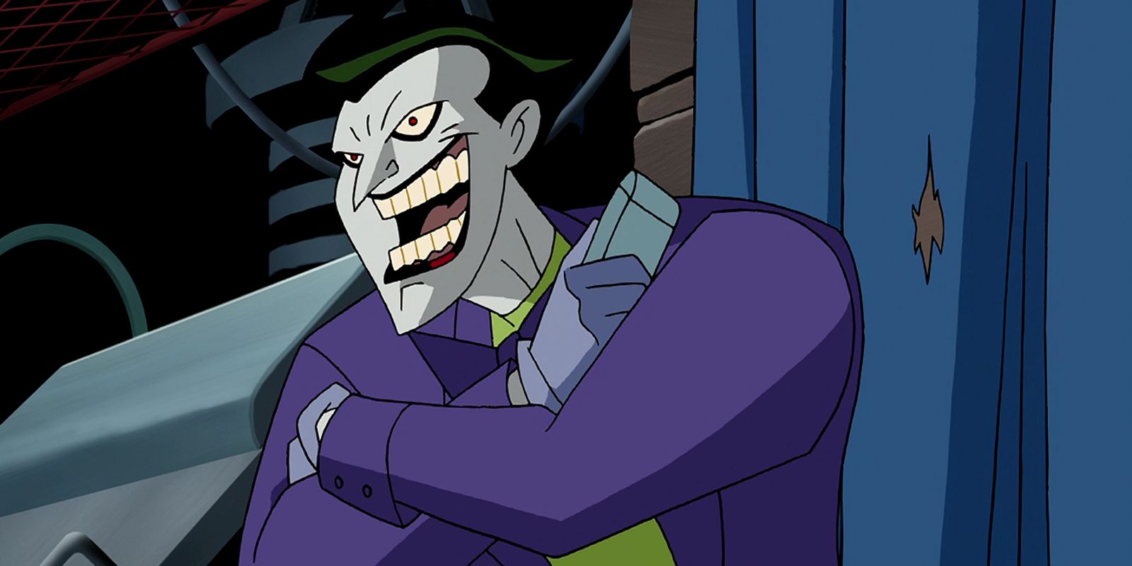The Joker laughing with his arms crossed in Batman Beyond: Return Of The Joker