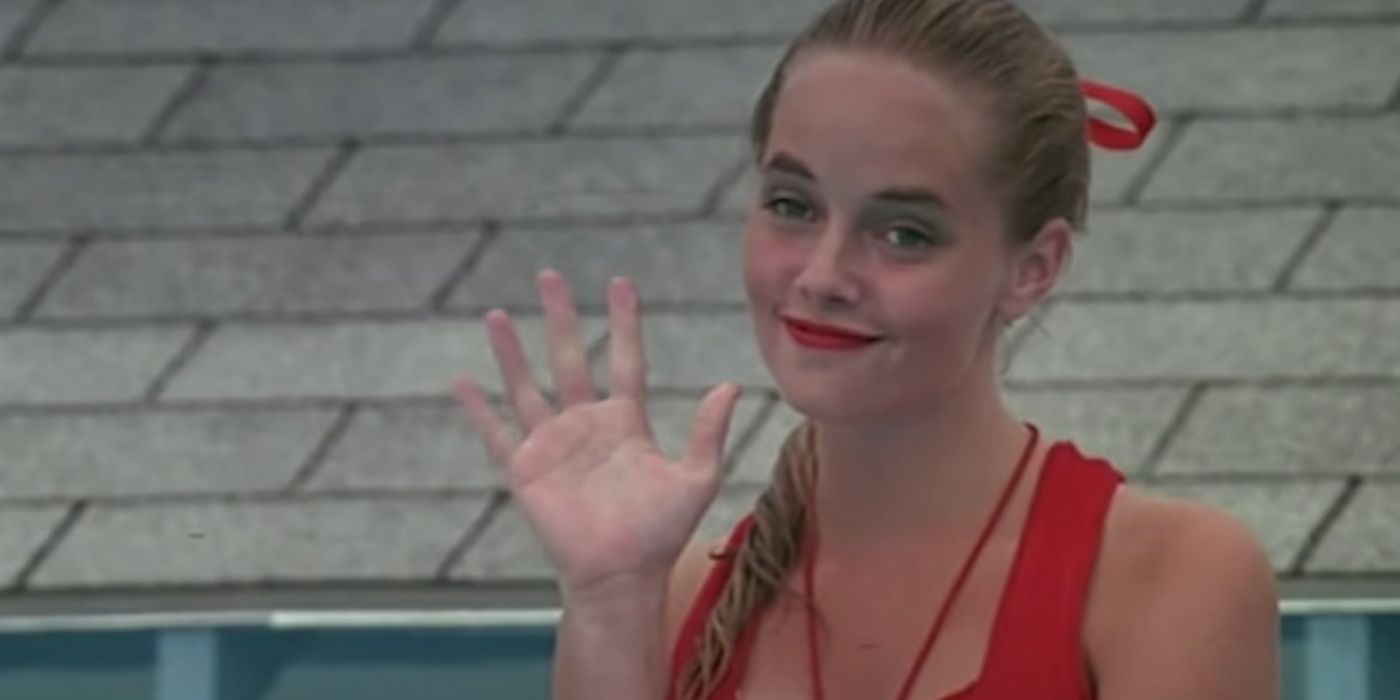 Wendy Peffercorn in a pool waving at someone in The Sandlot