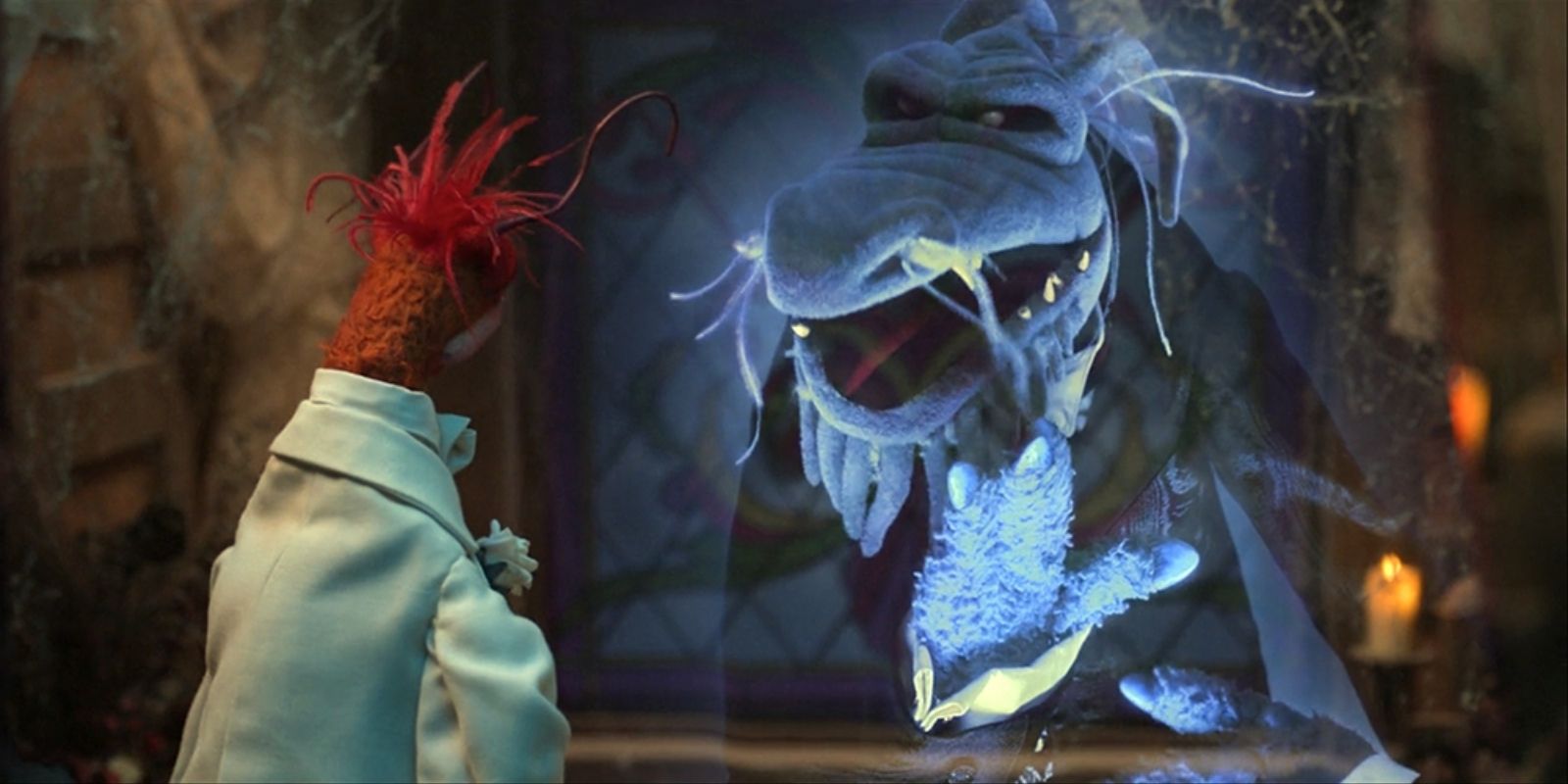 The ghost of Uncle Deadly talks to Pepe the King Prawn in Muppets Haunted Mansion