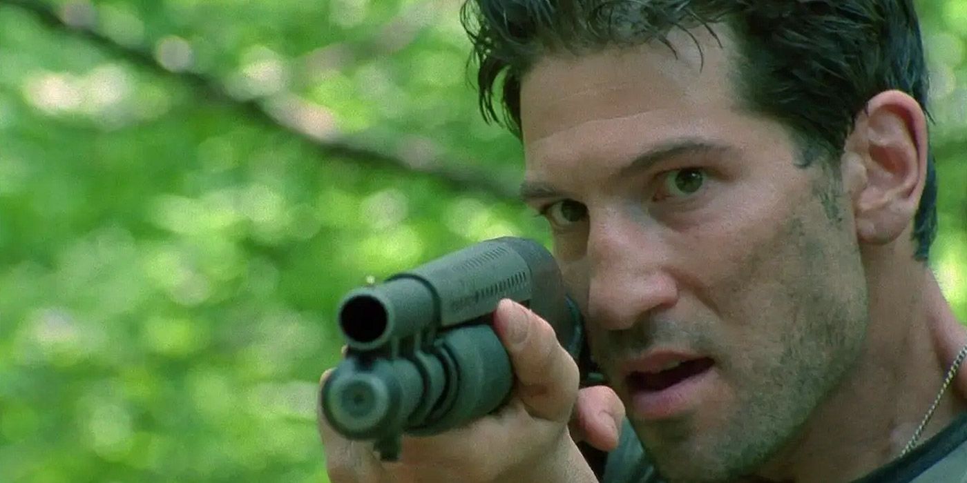 Shane aiming a shotgun at Rick in The Walking Dead.