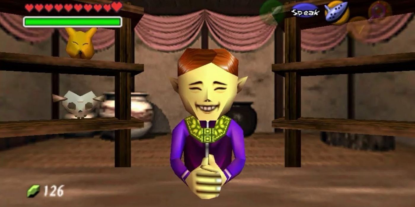 The Happy Mask Salesman sits at his desk in Ocarina of Time.
