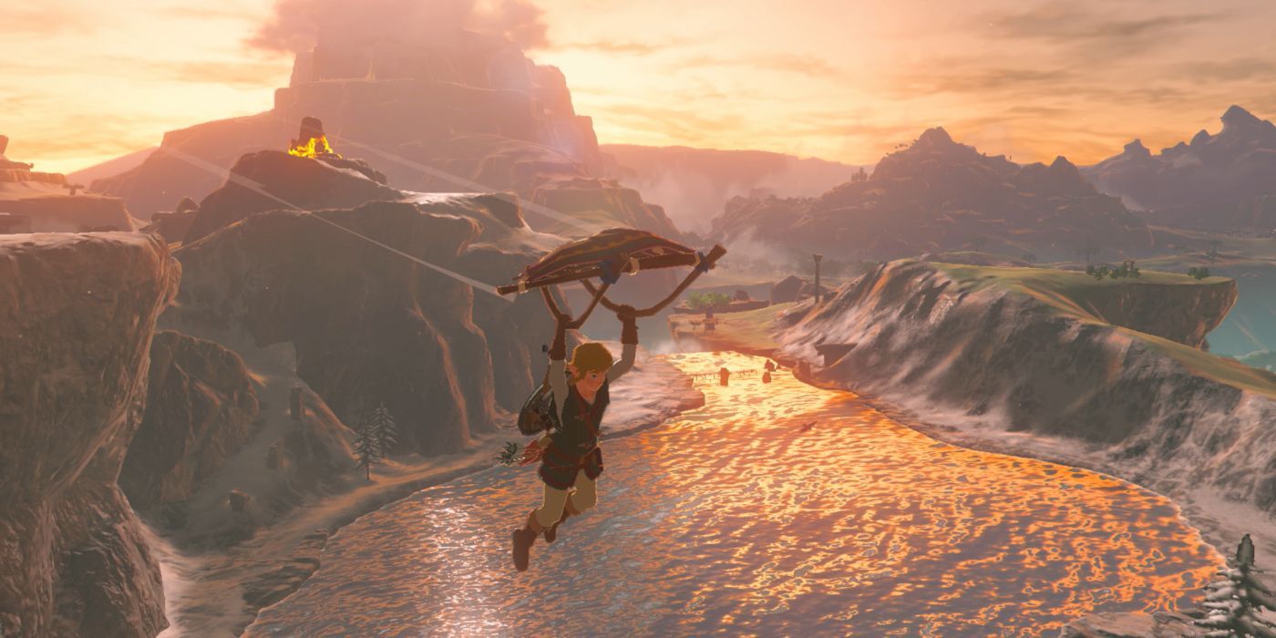 Link glides over a lake in Breath of the Wild.