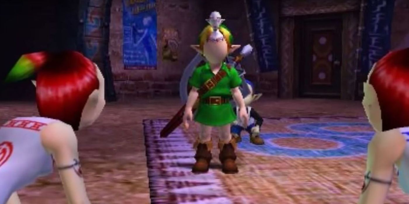 Link wears Kamaro's Mask as two women look on in Majora's Mask.