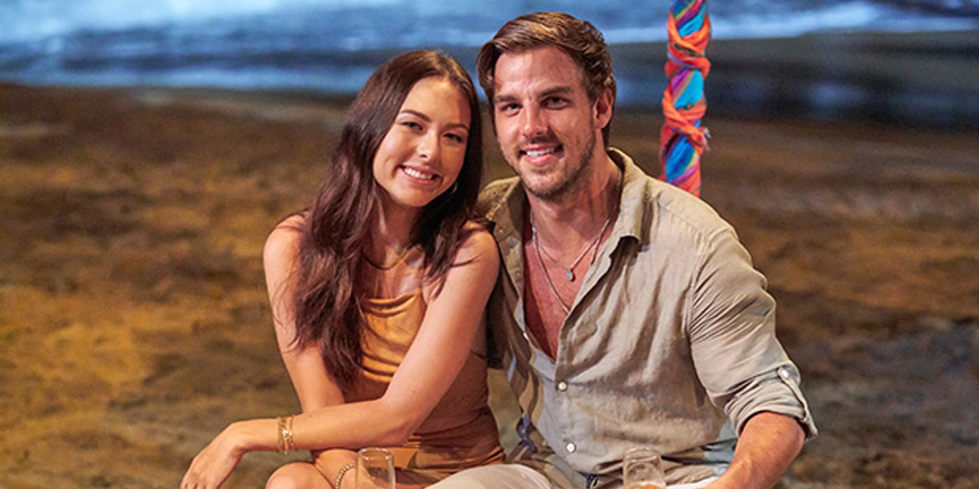 Noah and Abigail at the beach posing for the camera in Bachelor in Paradise