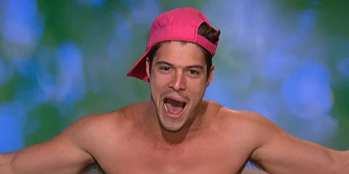 Zach Rance in the diary room on Big Brother, his arms outstretched on either side of the couch, mouth open in mid-sentence.