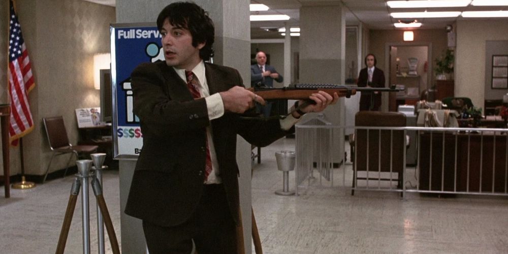 Sonny points a shotgun in the bank in Dog Day Afternoon