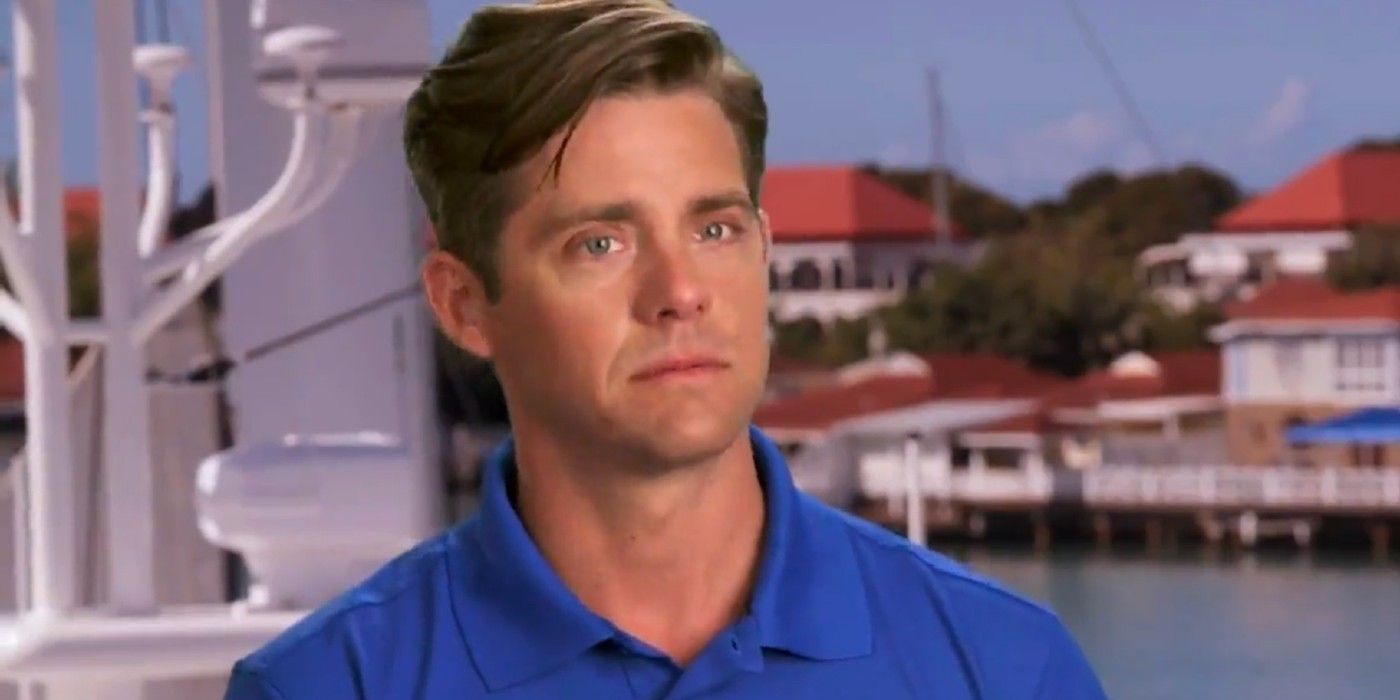 Eddie Lucas looks nervous during an interview in his jersey against the backdrop of the harbor below decks