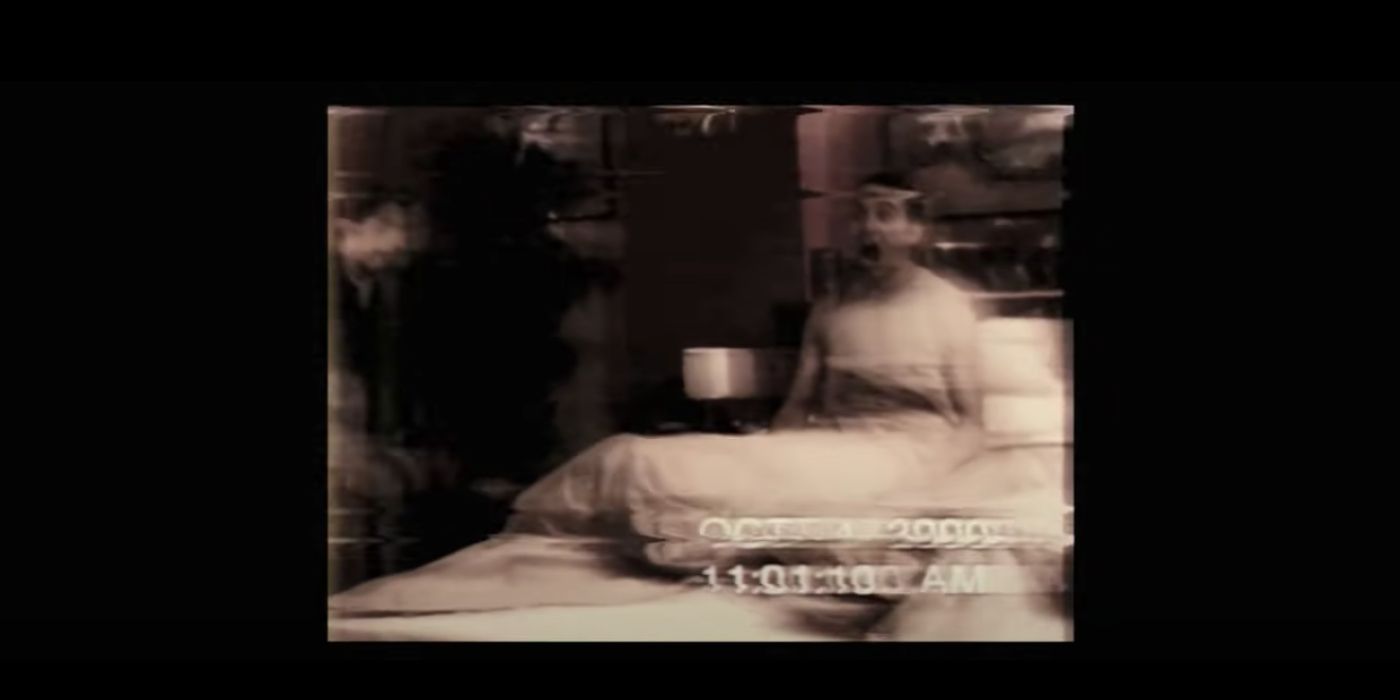 A man screams in bed in found footage from The Fourth Kind