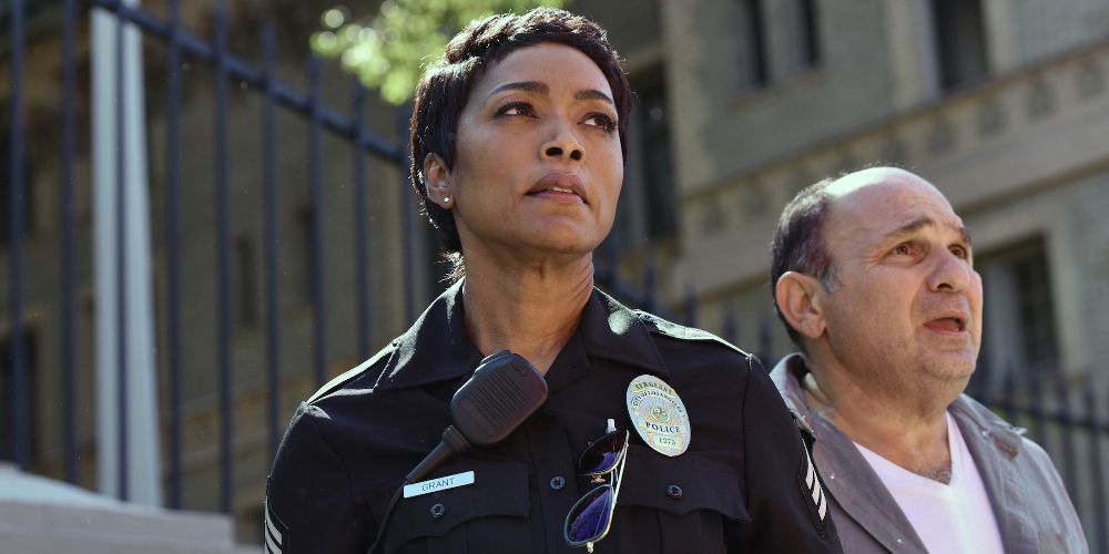 Athena looks on at a crime in 9-1-1