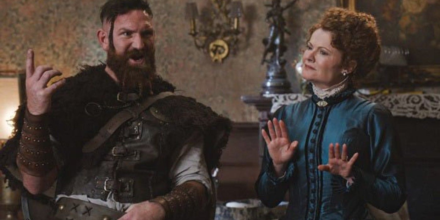 A viking and stately woman talk in CBS's Ghosts