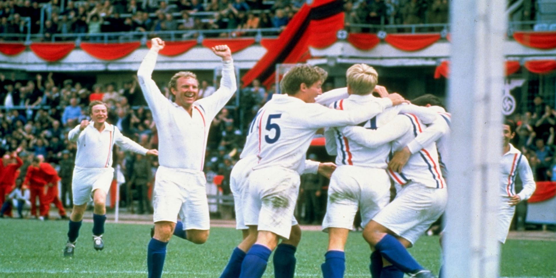 People celebrating a goal in Escape to Victory