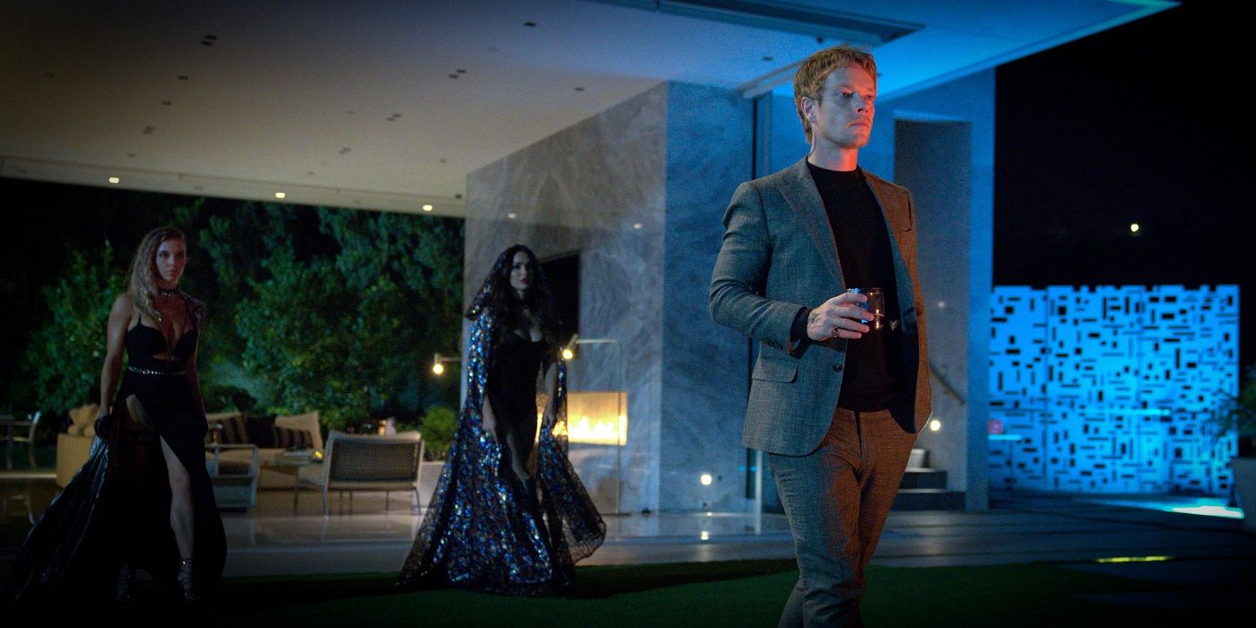 Alfie Allen&rsquo;s Victor holds a drink in a fancy house in Night Teeth
