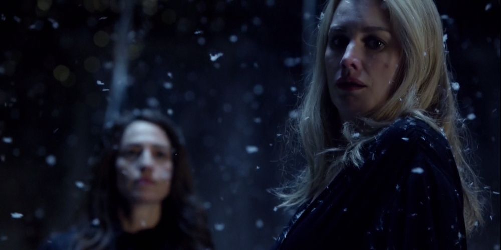 Esther stands in snowfall in The Originals