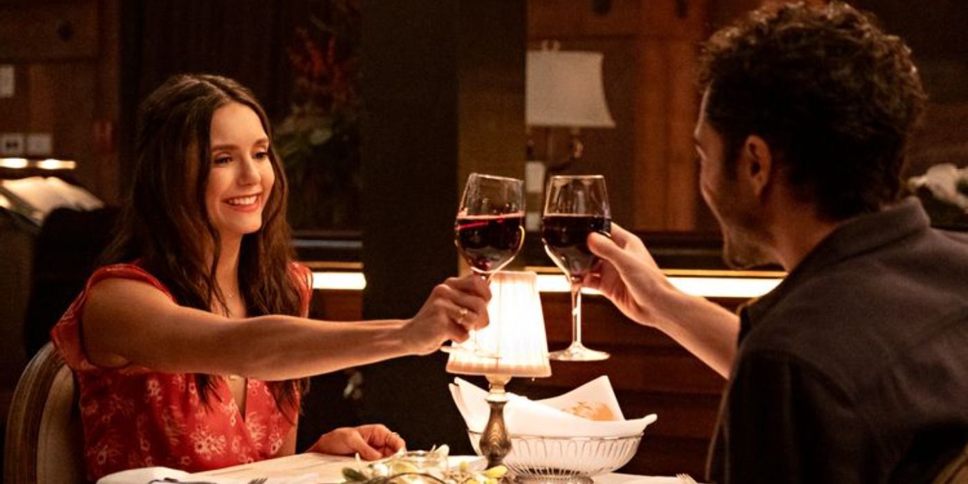 Natalie toasts on a date with Tag in Love Hard