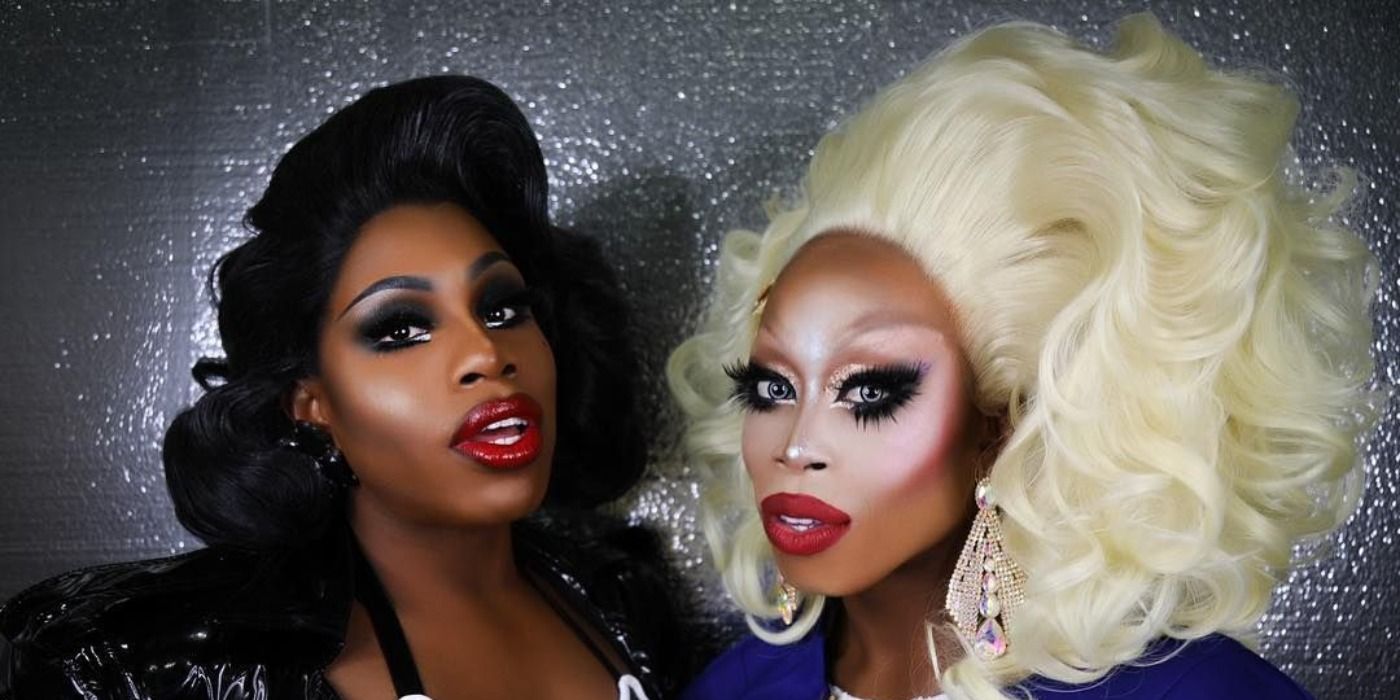 Monet and Monique from Drag Race photographed in front of a glittery silver background.