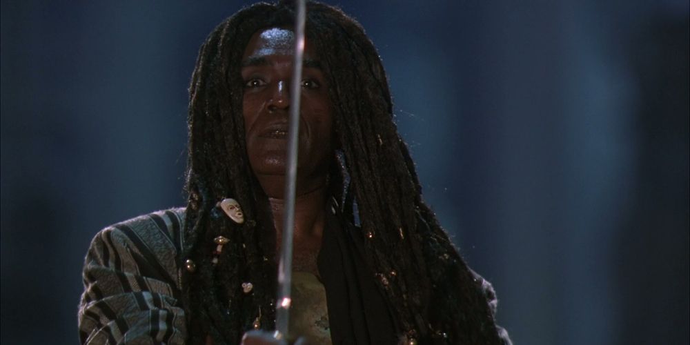 Willie holds a sword in Predator 2