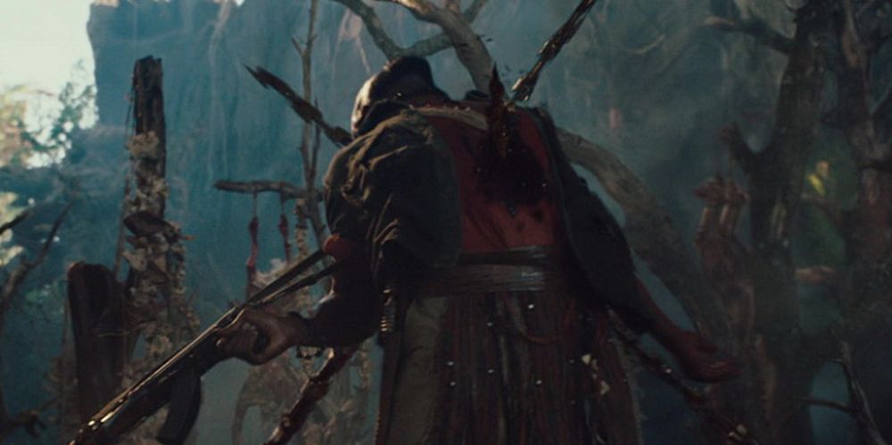 Mobasa is impaled by many spears in Predators