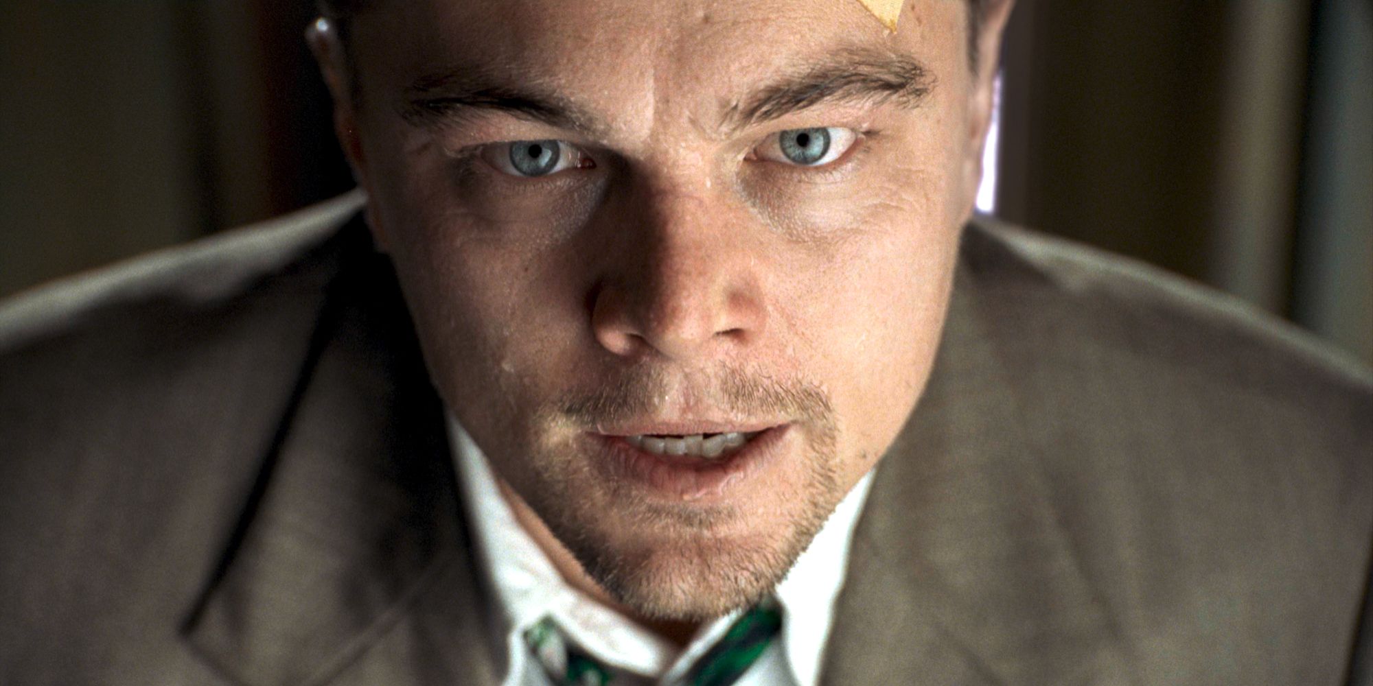 Leonardo DiCaprio looking worried in Shutter Island