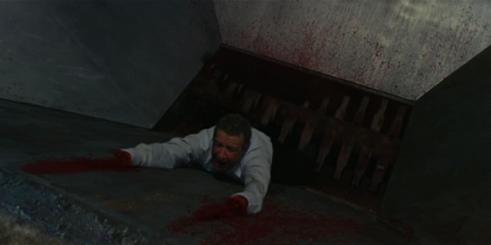 Burt falls in a meat grinder in Texas Chainsaw 3D 