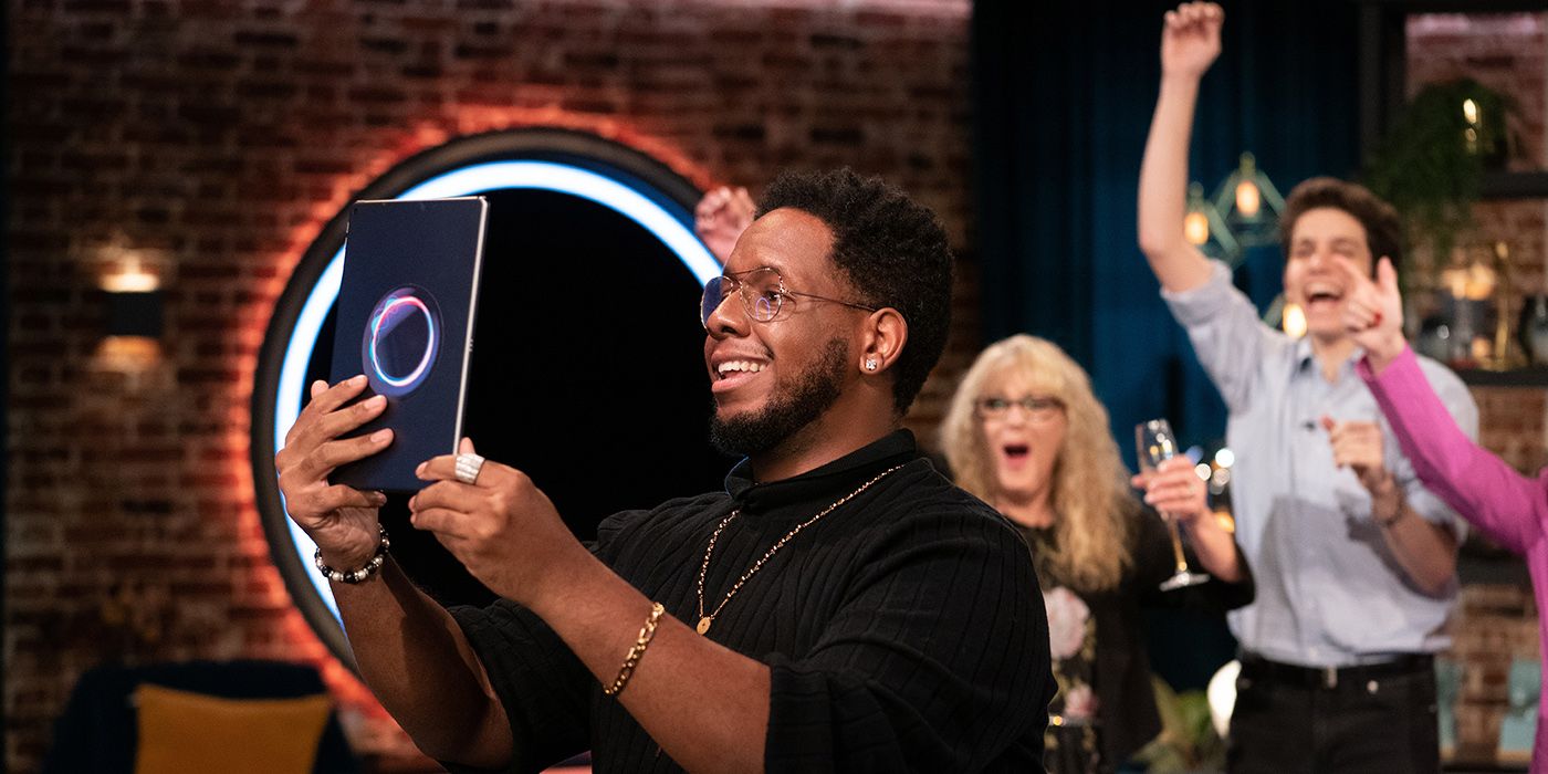 James at the finale of The Circle season 3, chatting with his girlfriend from a tablet.