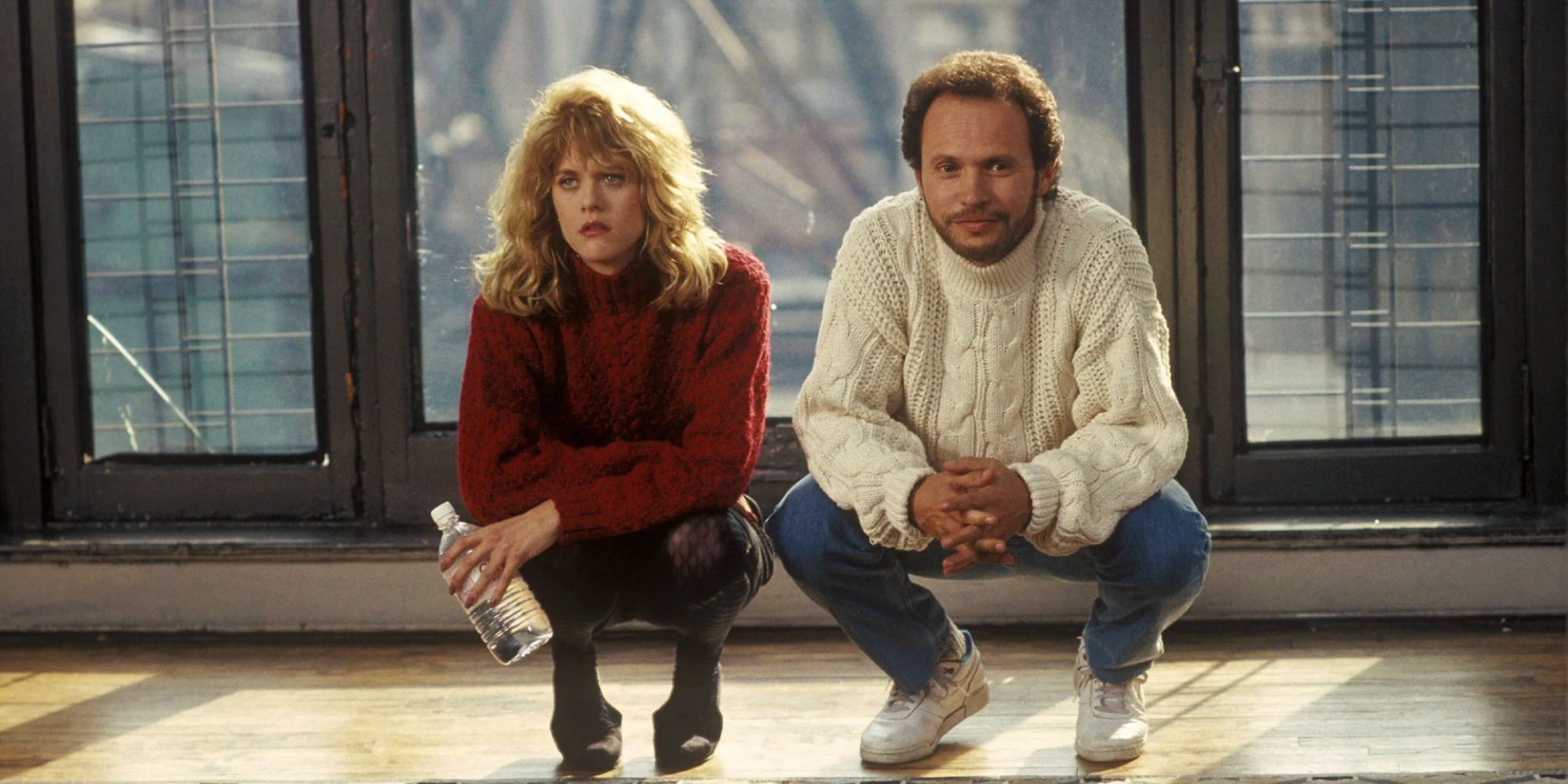 Harry and Sally crouching side by side in When Harry Met Sally
