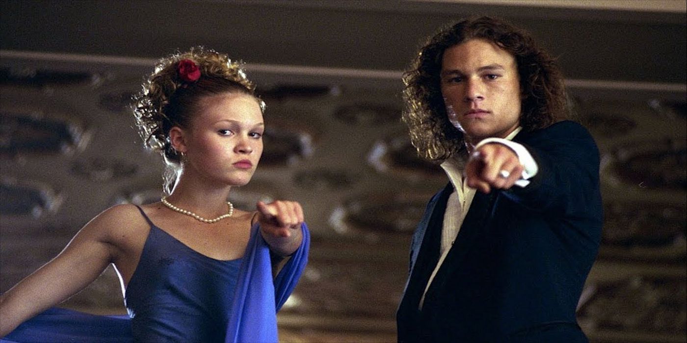 Kat and Patrick point while dressed in formal prom outfits in 10 Things I Hate About You.