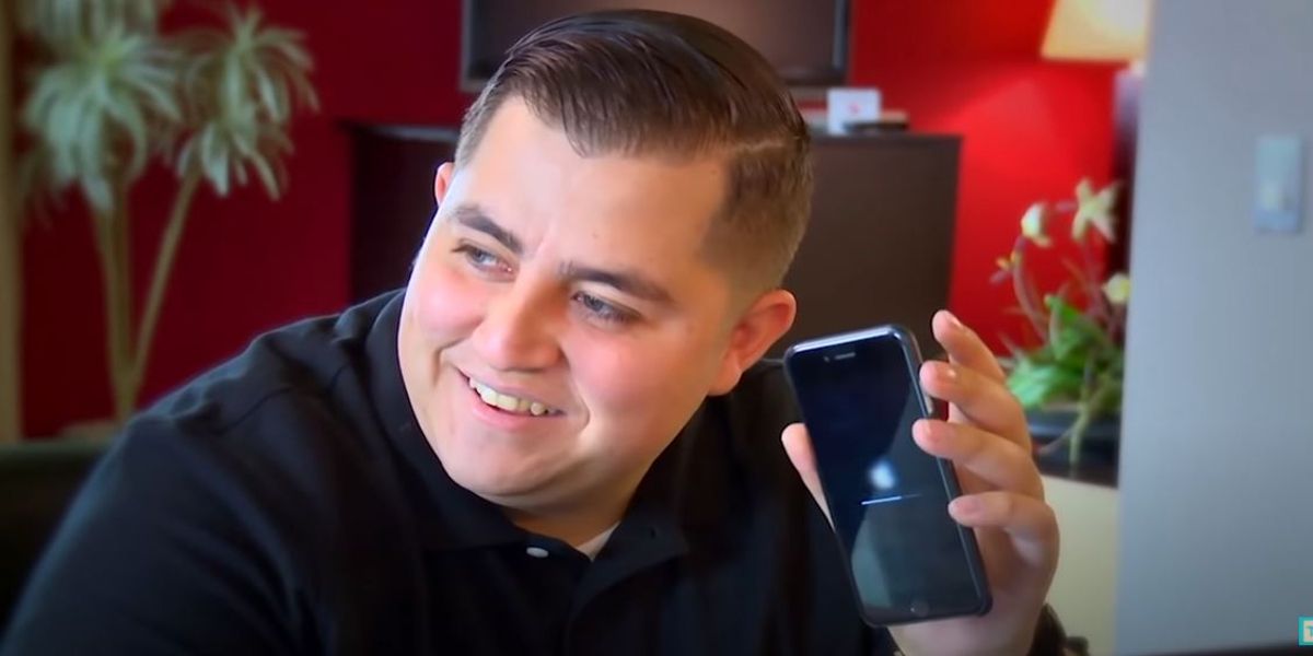 Jorge holding a phone and talking to the production crew on an episode of 90 Day Fiance.