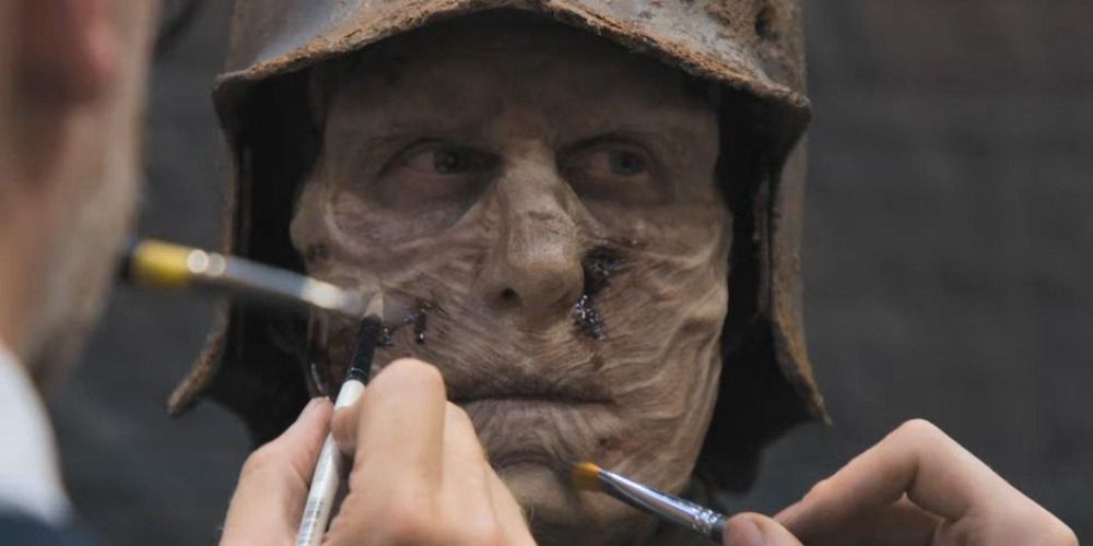 Makeup application for a whitewalker in Game Of Thrones: The Last Watch 