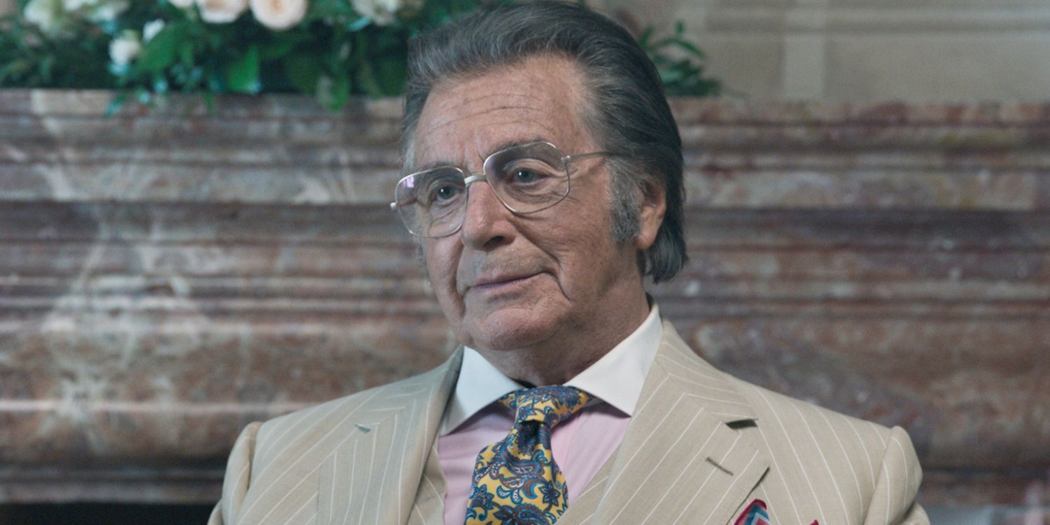Al Pacino grimaces while wearing a suit in House of Gucci.