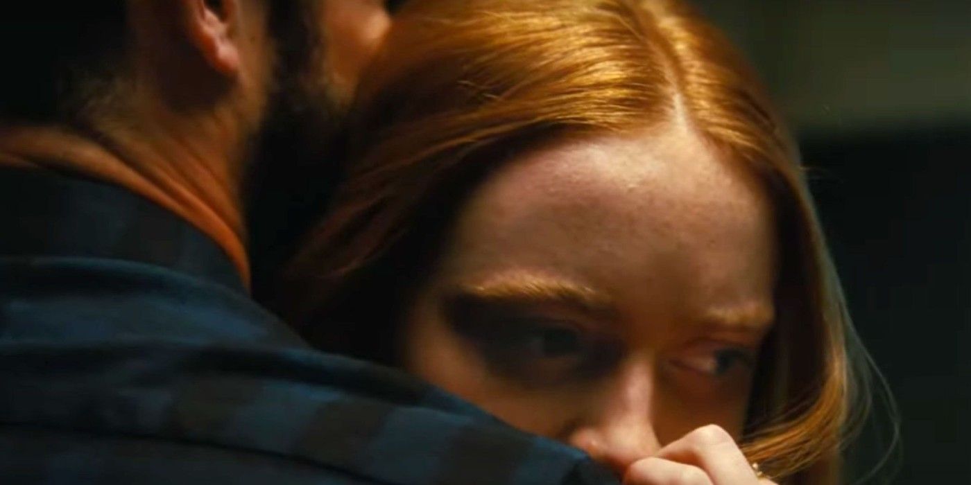 A closeup of Sadie Sink and Dylan O'Brien hugging in the "All Too Well" music video