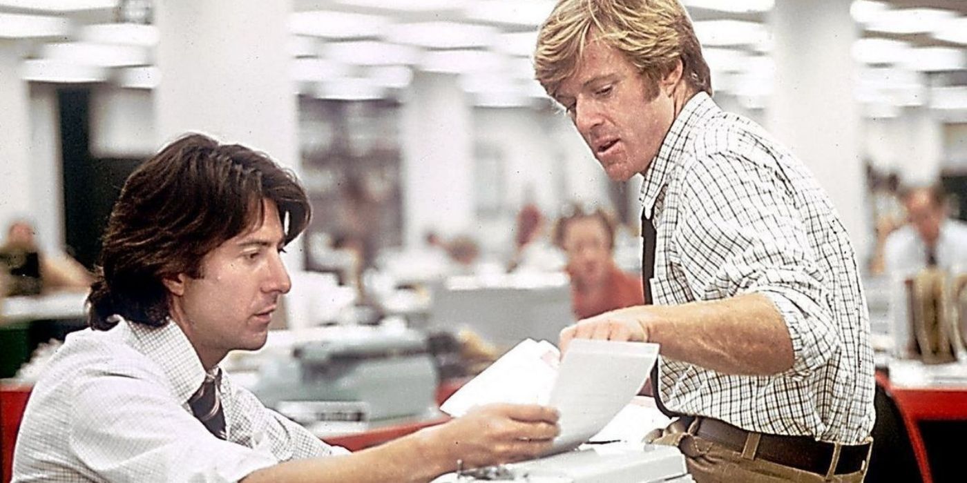 Bob and Carl looking at a document in All-the-President's-Men