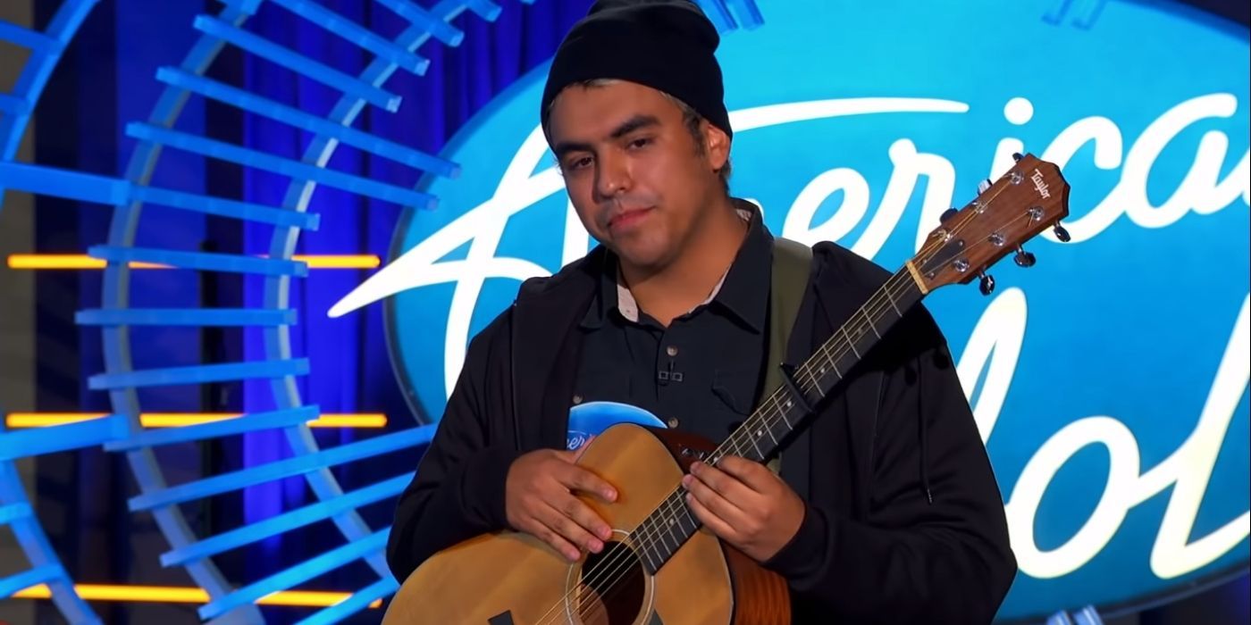 Alejandro Aranda with a guitar during his American Idol Audition