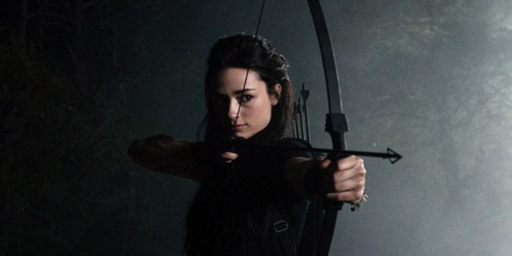 Allison Argent pointing a bow and arrow in Teen Wolf