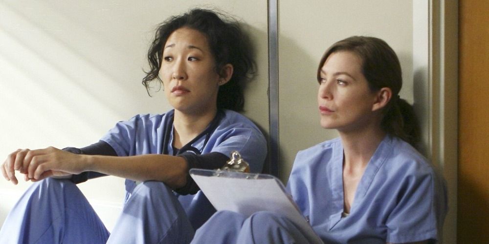 An image of Cristina and Meredith sitting together in Grey's Anatomy