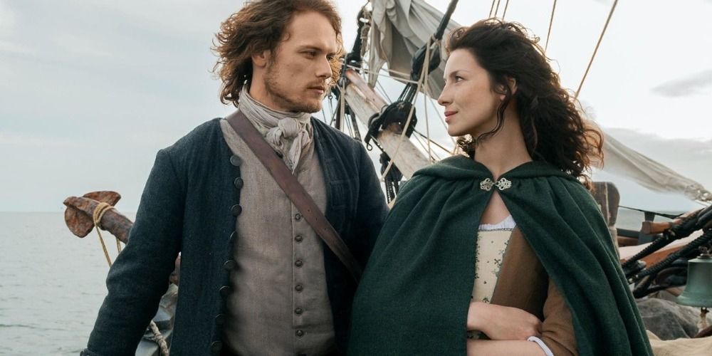 An image of Jamie and Claire standing on a boat in Outlander