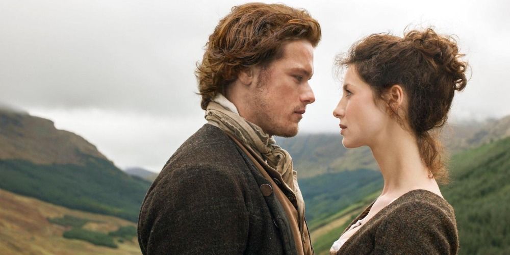 An image of Jamie and Claire standing on a rooftop in Outlander