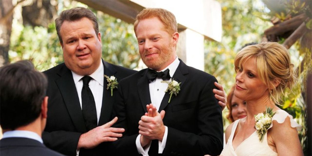 An image of Mitchell and Cam smiling in Modern Family