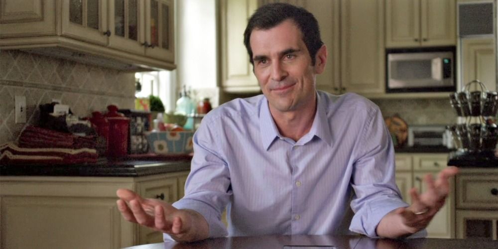 An image of Phil Dunphy smiling in Modern Family