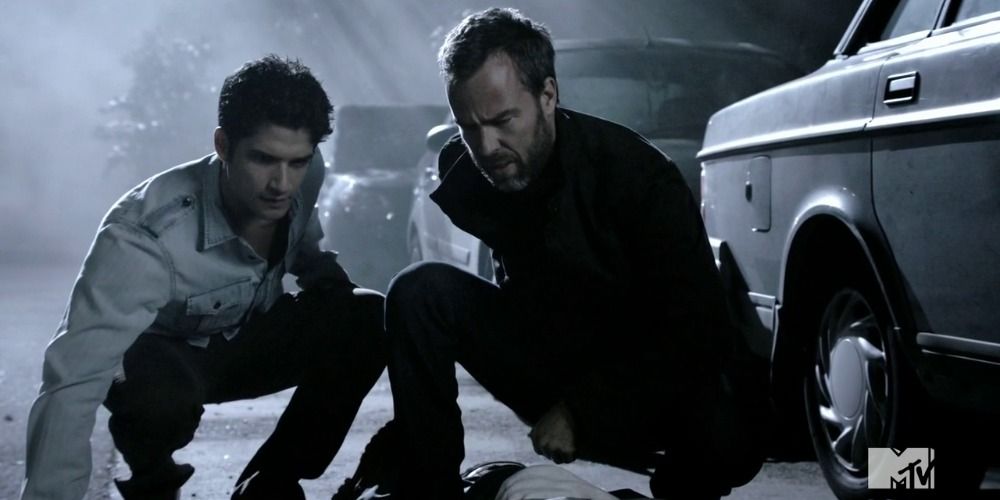 An image of Scott and Chris crouching together in Teen Wolf