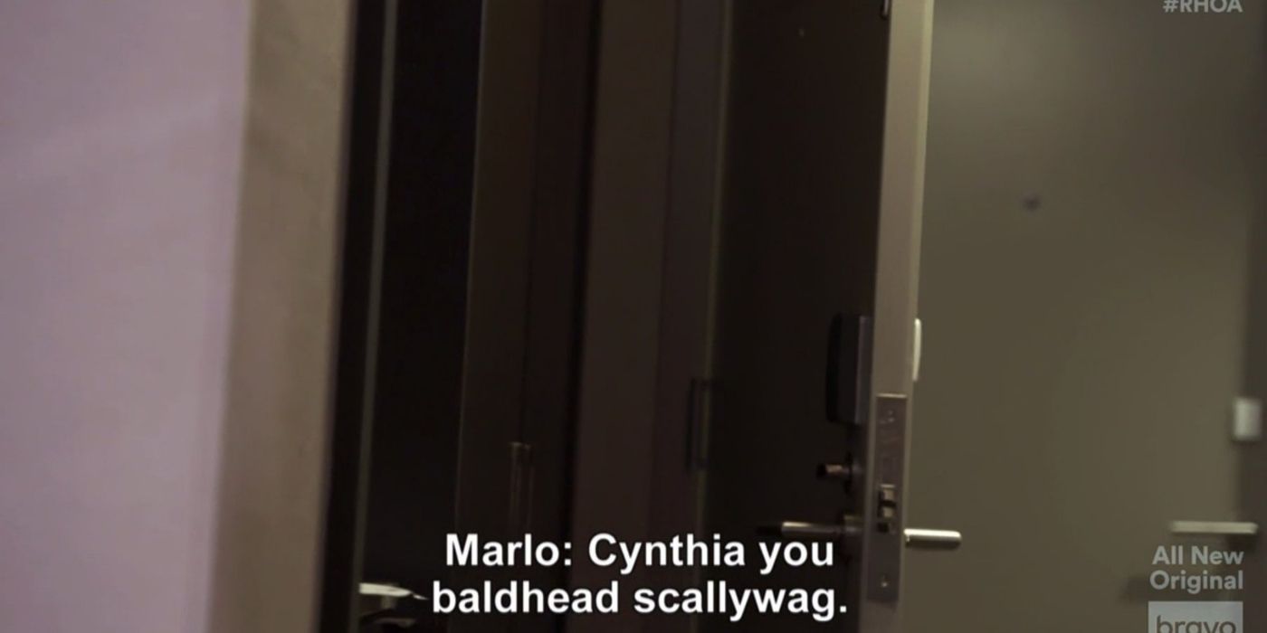 An image of a door while Marlo offends Cynthia on RHOA