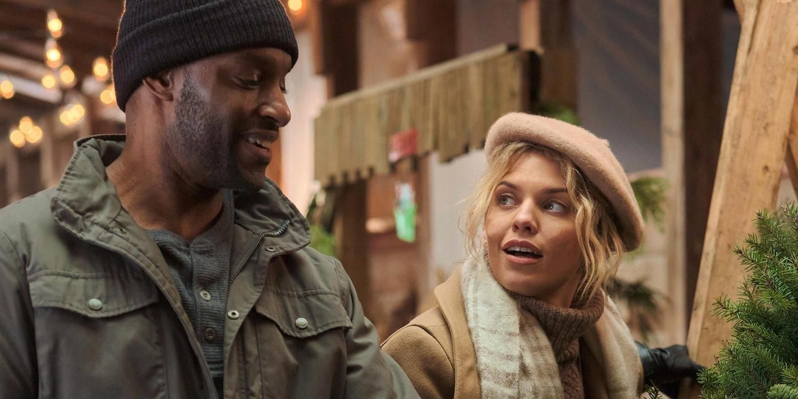 AnnaLyne McCord and Colin Lawrence shop for Christmas trees in Dancing through the Snow