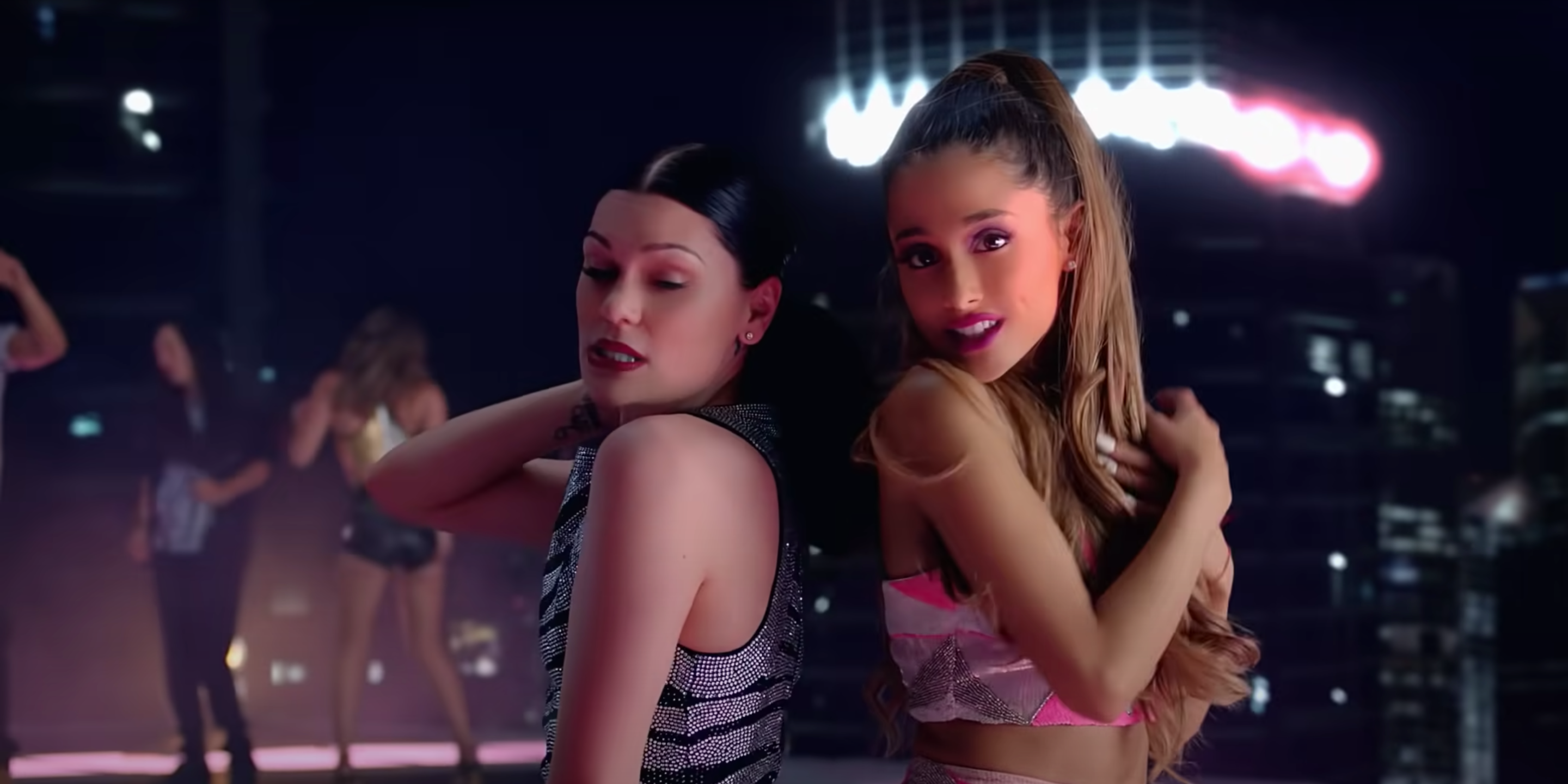 An image of Jessie J and Ariana Grande standing back-to-back in the music video for Bang Bang.
