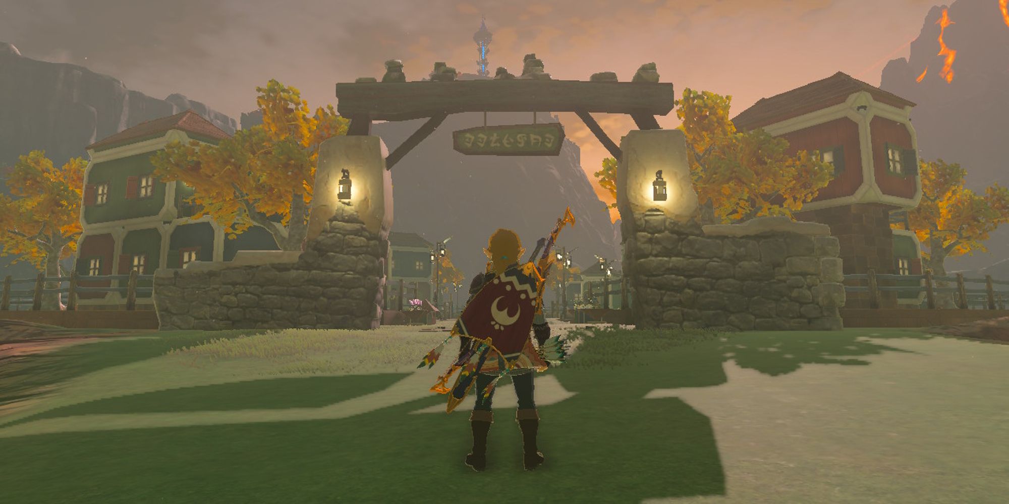 Link chega na cidade de Tarrey concluída de Breath of the Wild, filmado por trás dele olhando para a cidade