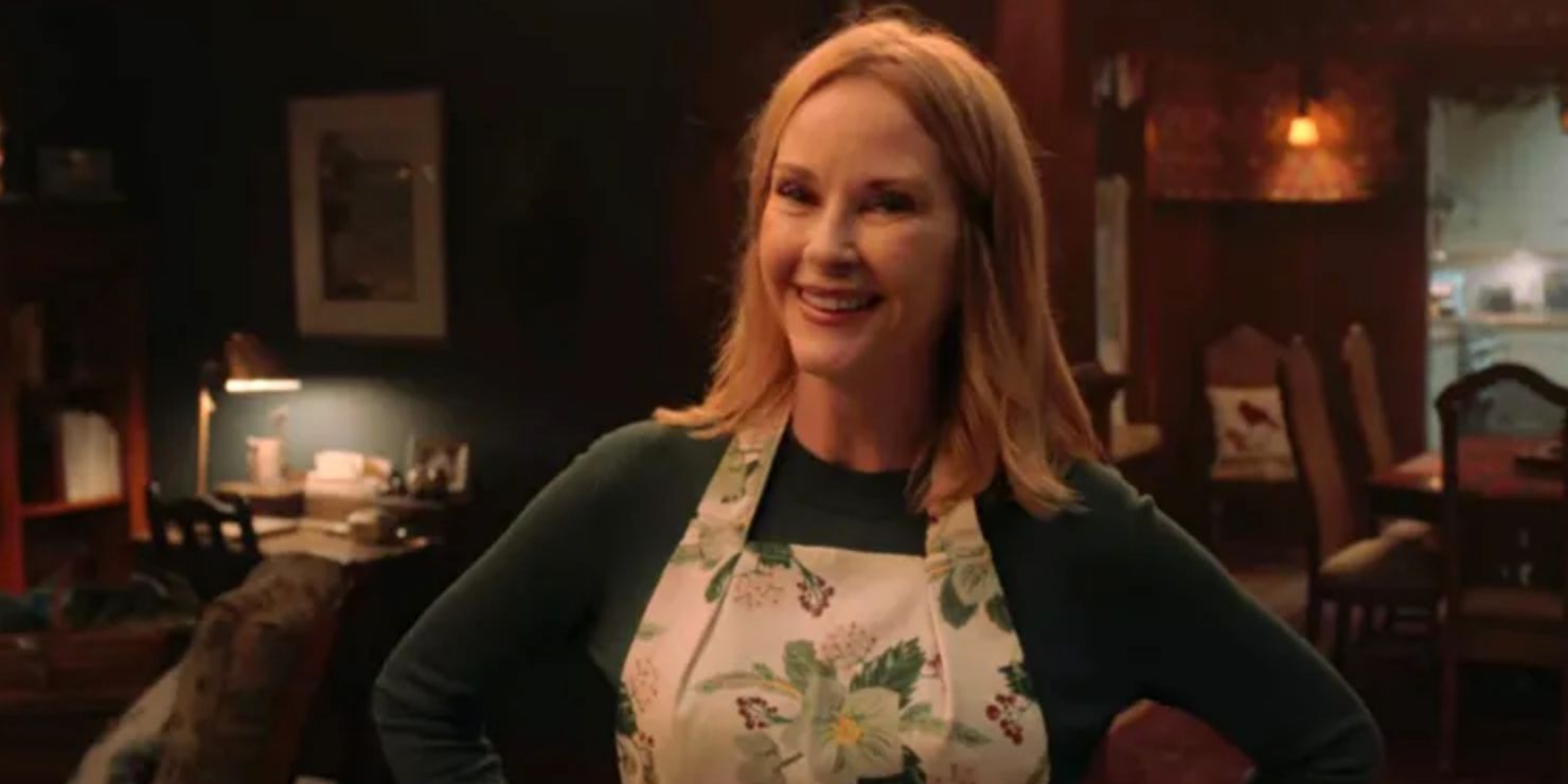 Barb Lin smiles in her apron in Love Hard