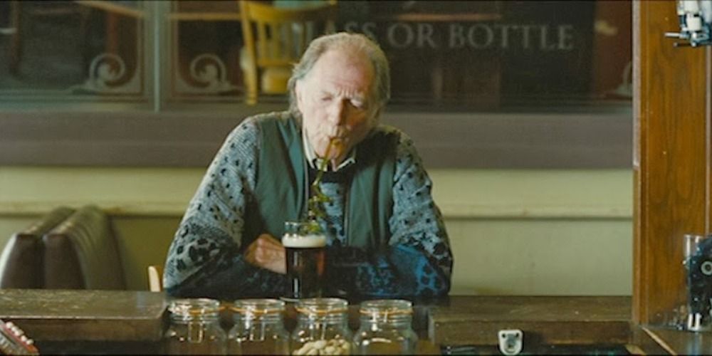 Basil in World's End sipping on a pint with a straw